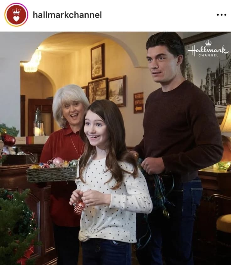 Morgan in a holiday scene featured by Hallmark Channel